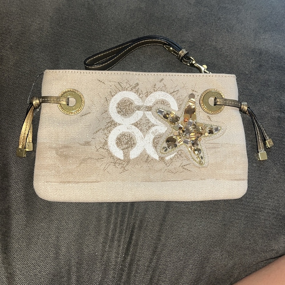 NWOT Elegant Coach Beige Clutch with Starfish Accent - Picture 2 of 8